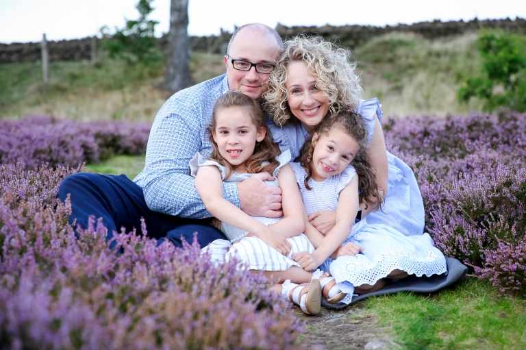 Family cuddling on a photo shoot at Beacon Hill Loughborough by Helen Keast